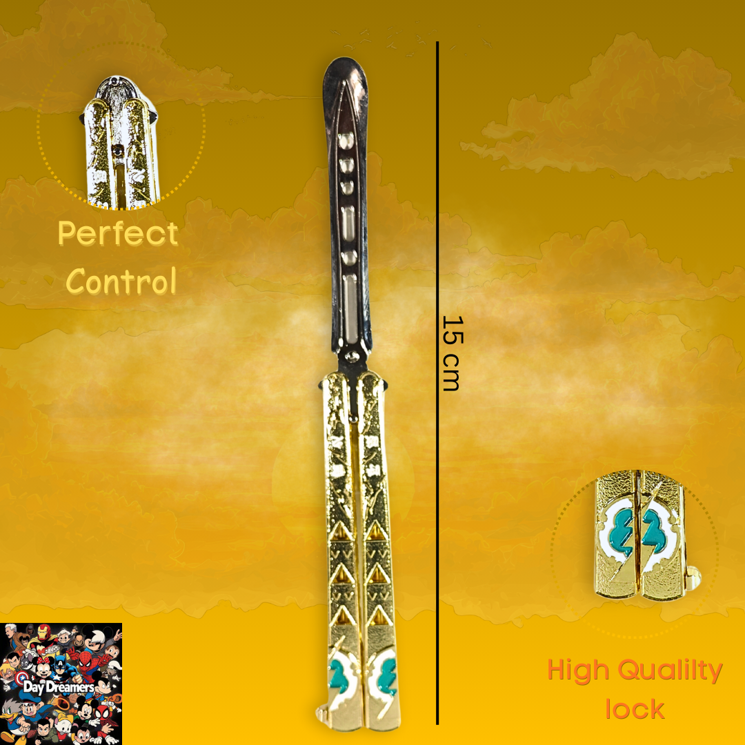 Gold-tone metal butterfly balisong trainer with engraved decorative pattern