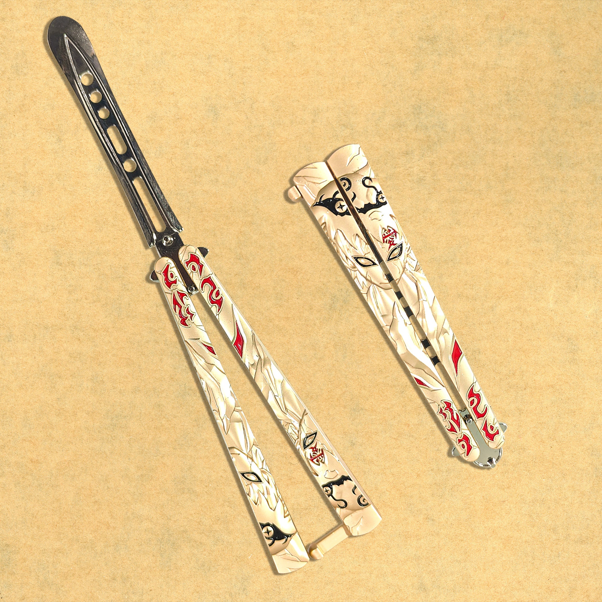 Golden Naruto engraved metal butterfly knife trainer with red accents — decorative balisong blade