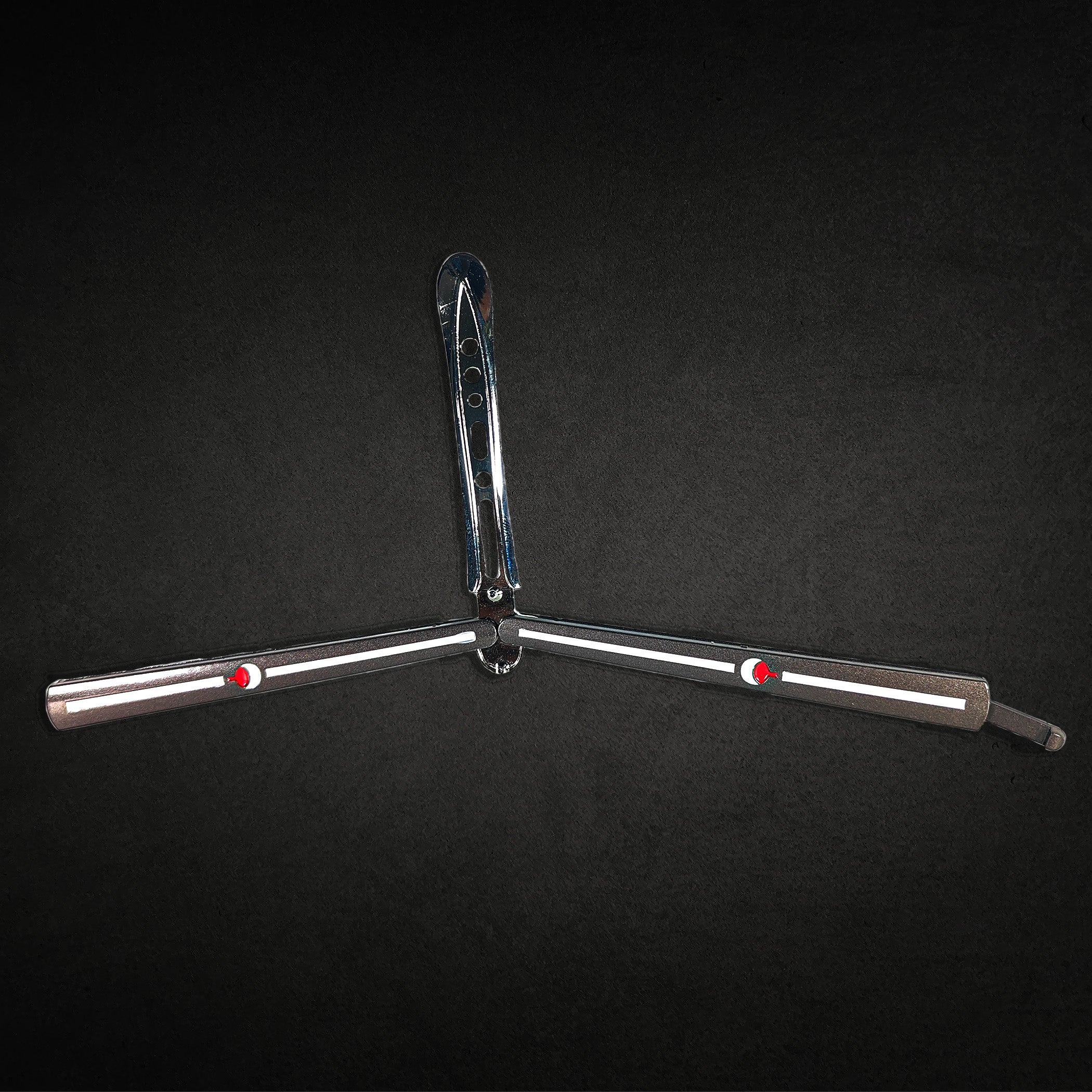 Uchiha Clan engraved metal butterfly knife trainer with smooth handles — anime-inspired balisong blade